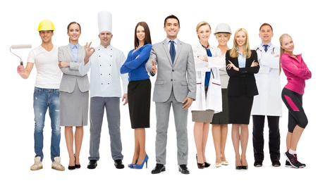 people, profession, qualification, employment and success concept - happy businessman over group of professional workers showing thumbs up